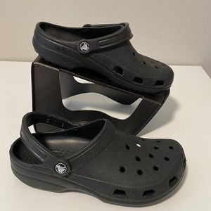 Crocs black slip ons Sz 7 men’s or 9 women’s